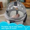 imageFisherPrice Portable Baby Bassinet Deluxe OnTheGo Projection Dome Travel Play Space for Newborns with Lights Music ampamp Canopy Paper ShapesGray